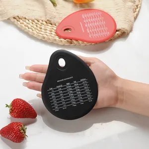 Tear-drop silicone dough scraper with printed kitchen measurement conversion chart