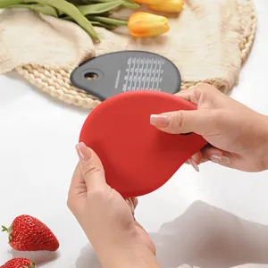 Flexible red water-drop silicone dough scraper with detailed measurement conversion scale