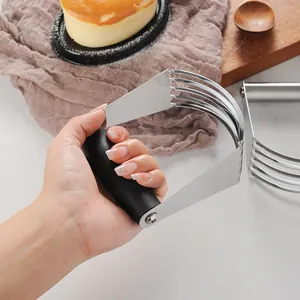 High-quality stainless steel pastry blender with black non-slip handle for efficient dough mixing