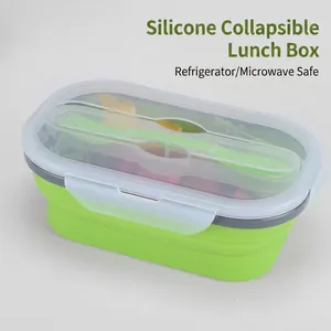 Draagbare groene opvouwbare siliconen lunchbox met geïntegreerde vork- en lepelset
