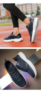 Close-up detail of breathable navy blue mesh running shoes on track and reflective surface