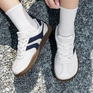 Comfortable and breathable white mesh German Army Trainers with navy blue stripes