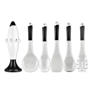 Juego profesional de 6 utensilios de cocina de silicona con soporte giratorio en blanco y negro