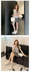 French style white ballet Mary Jane shoes with inner wedges and delicate bow details.
