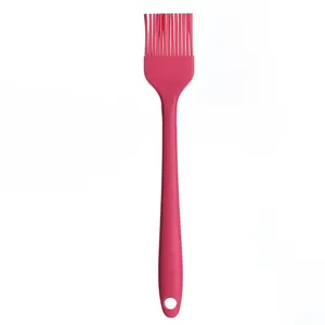 Professional small one-piece pink silicone basting brush for BBQ grilling and kitchen baking