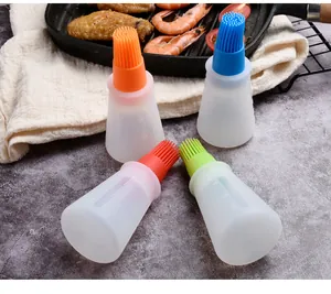 Detailed view of colorful silicone oil bottle brushes with scale for kitchen oiling and grilling