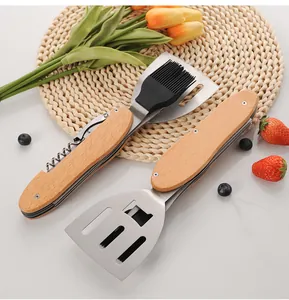 Foldable stainless steel BBQ multi-tool with wooden handle and silicone basting brush