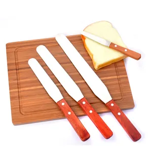 Professional stainless steel cake spatulas set with ergonomic wooden handles for baking