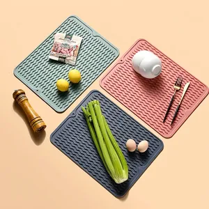 Set of 3 TPR heat insulation mats for kitchen with wavy non-slip texture in muted tones
