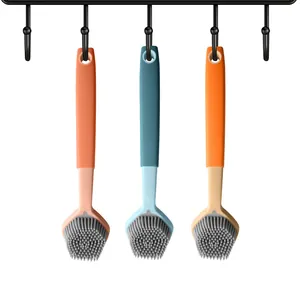 Set of 3 colorful silicone kitchen cleaning brushes for non-stick pans and dishes.