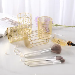 Eleganter goldener Make-up-Pinselhalter und Schreibwaren-Organizer aus Metall für den Schreibtisch.