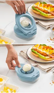 Detail view showing a 3-in-1 Japanese style egg slicer cutting hard-boiled eggs