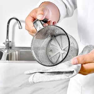 Professional handheld plastic semi-automatic flour sifter for baking, shown being cleaned.