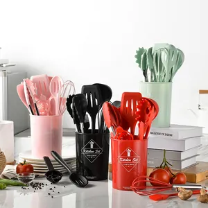 Colorful 10-piece silicone kitchen utensil sets in storage buckets on a kitchen counter