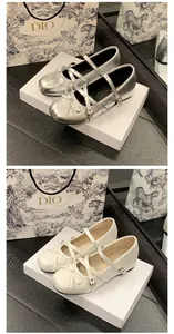 Detail of French style Mary Jane ballet flats with cute bow and cross straps.