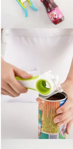 Close-up detail of the multi-functional 4-in-1 kitchen tool opening a metal ring-pull can