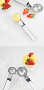 Comparison of two different sized stainless steel ice cream scoops with sorbet detail