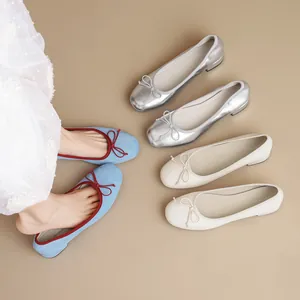 Elegant round toe ballet flats with bow and low block heel in multiple colors