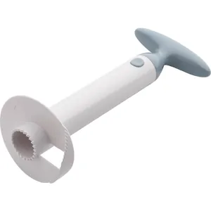 Manual plastic pineapple corer and slicer tool with grey handle on white background