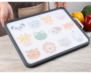 Double-sided cutting board with colorful cartoon animal patterns and sturdy handle