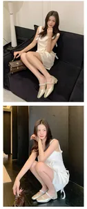 Asian model showcasing champagne French Mary Jane chunky heels in a luxury indoor setting