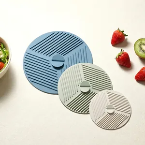 Multi-size silicone spill-proof lids for pots and bowls, heat-resistant kitchen tools.