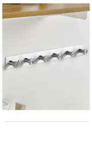 Wall-mounted stainless steel row rack featuring six round hooks for towels and clothes