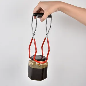 Sollevatore ergonomico per barattoli in acciaio inox con rivestimento antiscivolo rosso