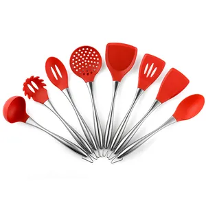 8-piece red silicone kitchen utensil set with stainless steel handles, white background