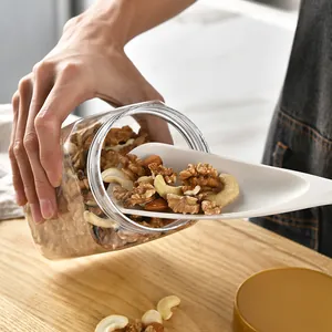 Vielseitiger weißer Silikon 2-in-1 Entenschnabel-Spatel zum Schöpfen von Nüssen aus dem Glas