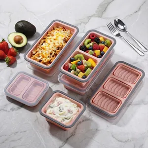 Collapsible silicone food storage containers with lids for meal prep and freezing.