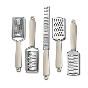 Professional 5-piece stainless steel cheese grater set with ergonomic cream-colored handles