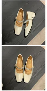 Top and side view of elegant champagne Mary Jane heels with rhinestone straps