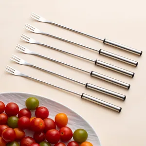Six-piece stainless steel fruit fork set for dessert and fondue with cherry tomatoes