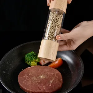 Premium manual oak wood and acrylic pepper grinder for fresh seasoning in kitchen