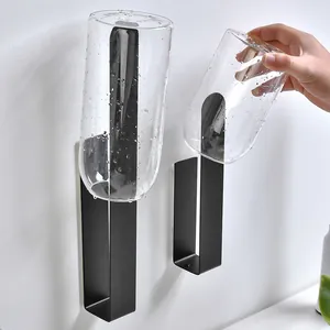 Black wall mounted stainless steel rack for cup drainage and kitchen paper towel storage