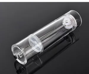 Close-up view of clear acrylic cylindrical manual pepper grinder for kitchen seasoning