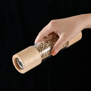 Premium manual oak and clear acrylic pepper grinder with visible peppercorn chamber