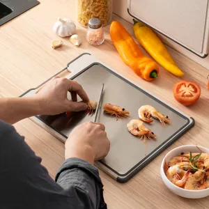 4-in-1 stainless steel double-sided cutting board with knife sharpener for kitchen