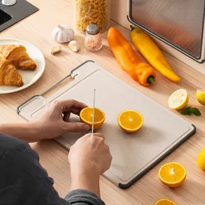 Multifunctional double-sided cutting board with built-in sharpener for fruit slicing