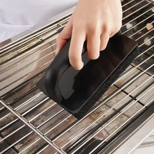 Professional BBQ grill cleaning brush with ergonomic handle for heavy duty scouring tasks