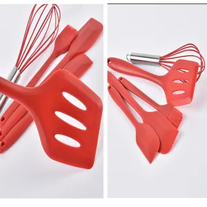 Detail view of 5-piece red heat-resistant silicone kitchen utensil set for baking