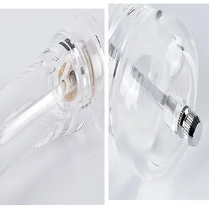 Detail view of acrylic spice grinder showing ceramic core and metal adjustment knob