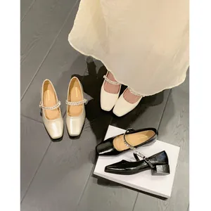 Elegant French style Mary Jane pumps with chunky heels and sparkling rhinestone straps