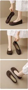 Detailed view of vintage brown suede split-toe Tabi flat shoes showing various angles