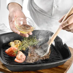 Professional wooden handle silicone oil brush for basting steak in grill pan setup