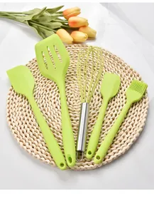 5-piece light green heat resistant silicone kitchen utensil set with whisk and spatulas