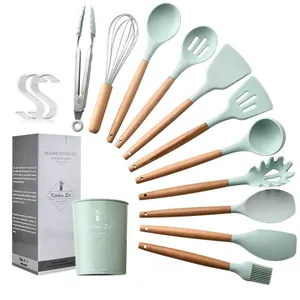 11-piece silicone kitchen utensil set with wood handles and storage bucket