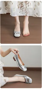 Elegant silver French ballet flats with bow detail and low block heels for women