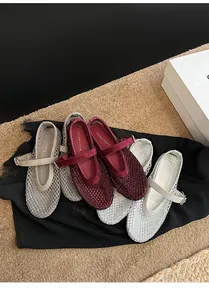 Detailed view of rhinestone-embellished mesh Mary Jane flats in multiple colors